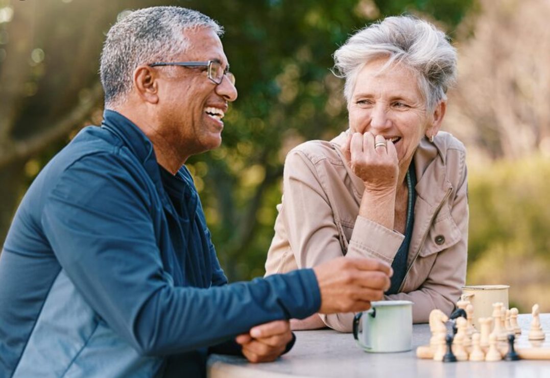 Mature couple talking during a country walk